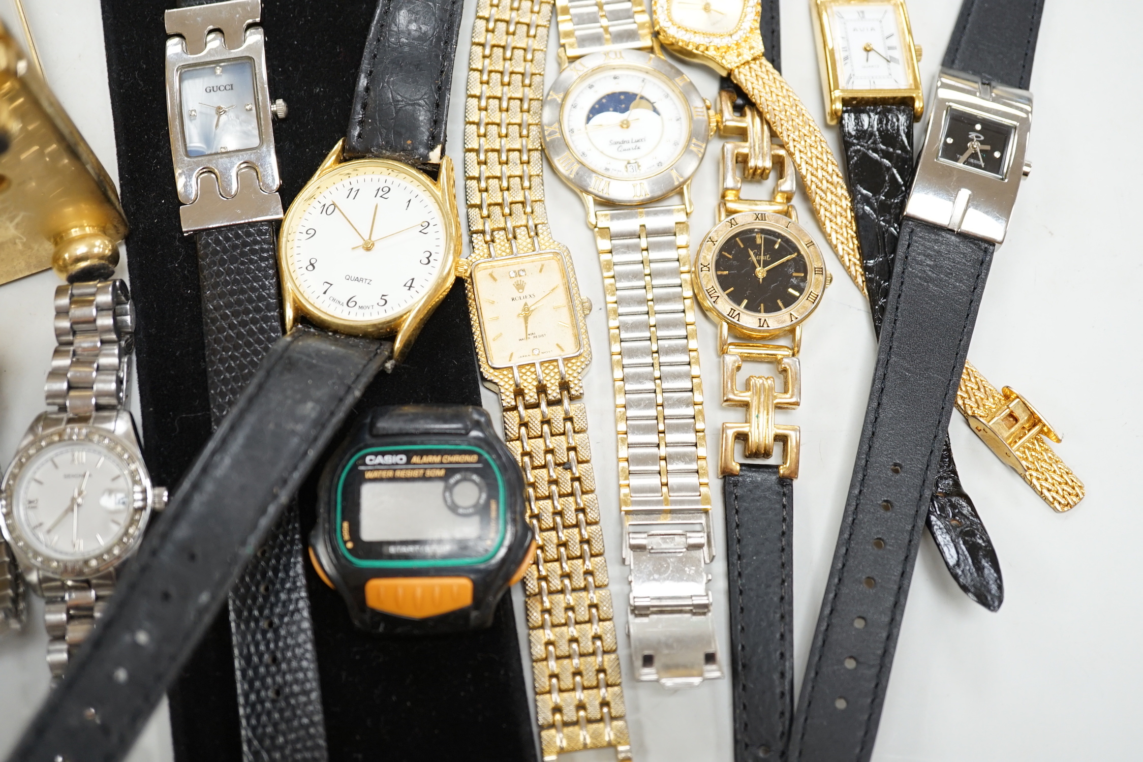 A modern brass cased carriage timepiece and a quantity of assorted lady's and gentleman's modern wrist watches.